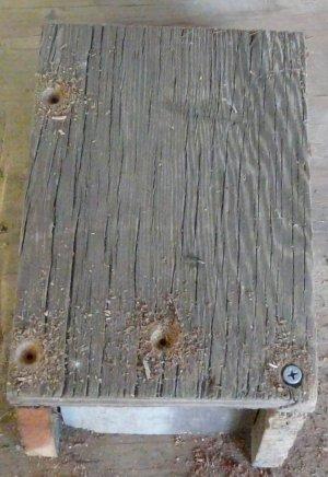 The non-hinged side gets two screws, the hinged side gets one screw at bottom.