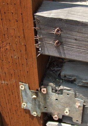 Toe nailing (toe screwing) or metal plate to attach runner.