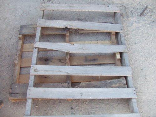 Look for pallets that are hardwood, they'll be heavy, and have long runs between nails. The top one is preferred over the bottom one.