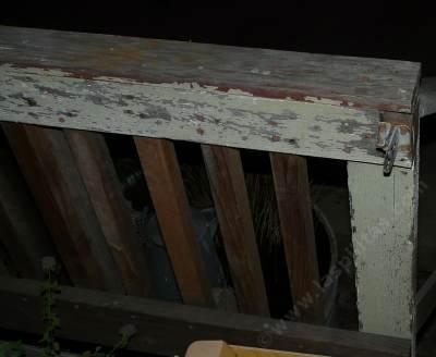 To make a 80 year old porch rail legal, I attached 2X2's and added a bottom runner.