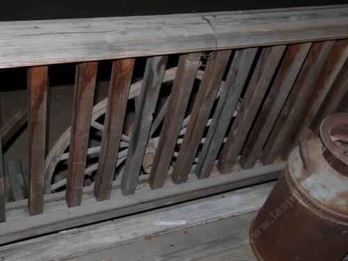 Screwed from top and bottom with wooden keepers front and back.