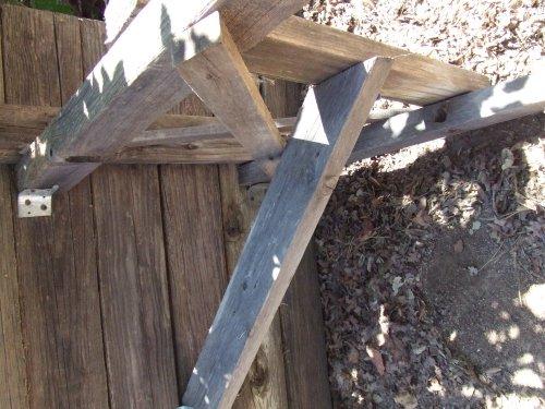 This table was built with heavier wood, nailed and metal clips.