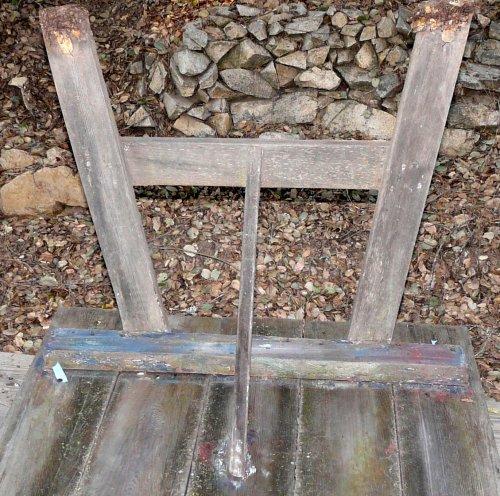 The underside of the picnic table.