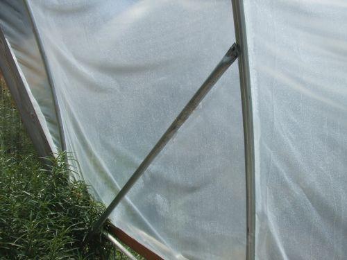 If the greenhouse is tall(this one was about 15 feet) a few side braces are helpful