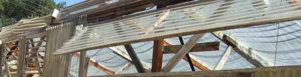 The two aluminum shutters are dwarfed by the 12 foot long polycarbonate vent