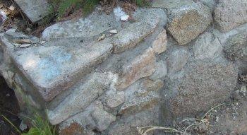 a new rock wall in an existing garden