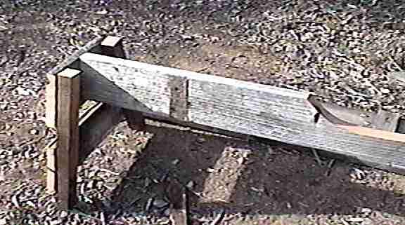 I've cut a slice out of the cross piece to allow the cross ties to hold the old boards.