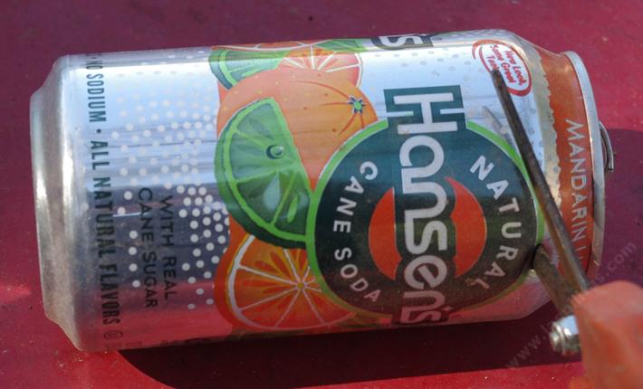 Heavy scissors work better than garden snips for cutting the can.