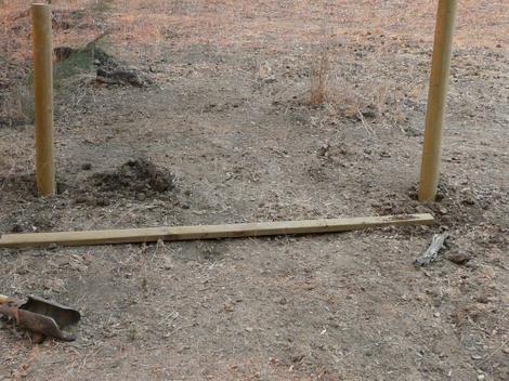 before you dig your post hole for your fence brace, check with the boards you are going to use and make sure you do not dig beyond the length of your available boards. - grid24_12