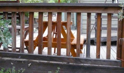 Deck rail or fence made out of 2x2 redwood with a 2x6 cap. - grid24_12