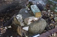 Here is the pillar for the bench  before the final cement and rock is put in place. The nails and screws go into the wet cement. - grid24_6