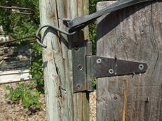Bungie cords make good door clowers. Before you snort, the bungie is made in USA and cost $2, the spring was made in China and cost $5 - grid24_6