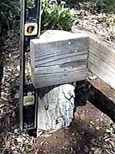 sink the post into ground and check both vertical and horizontical levels - grid24_6