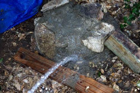 After a few minutes lightly wash the excess mortar off of the rocks so the bench base looks like rock, not cement. - grid24_12 After a few minutes lightly wash the excess mortar off of the rocks so the bench base looks like rock, not cement. - grid24_12