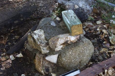 Here is the pillar for the bench before the final cement and rock is put in place. The nails and screws go into the wet cement. - grid24_12 Here is the pillar for the bench before the final cement and rock is put in place. The nails and screws go into the wet cement. - grid24_12